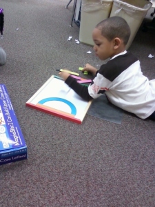 Student using Fundanoodle by Carolina Pad I Can Build Upper Case Letters kit